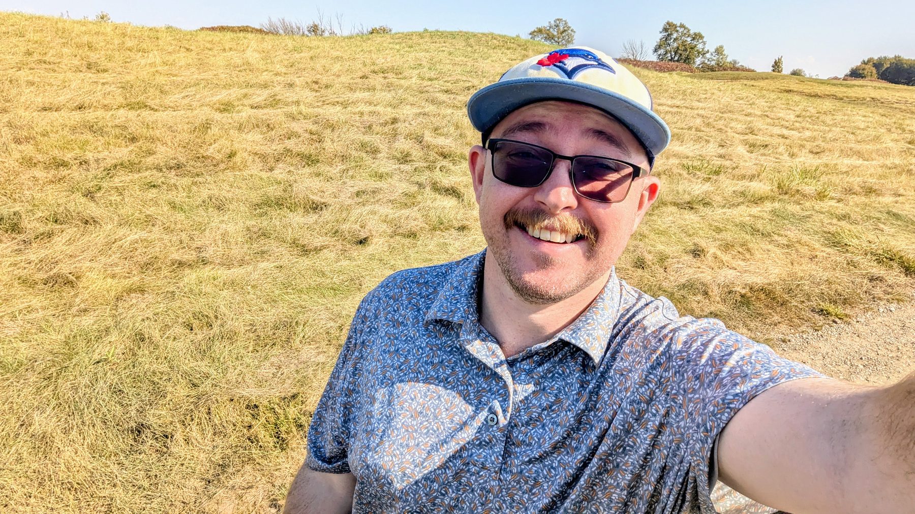 Bob Campbell in the fescue off the fairway